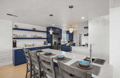 Channel Islands House | Waterfront home with kayaks, grill, Pac-Man, AC, balconies, & smart TVs