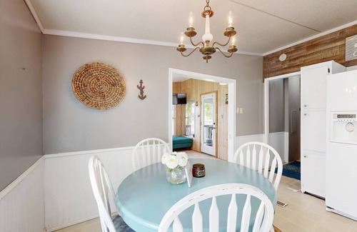 Enchanted Oaks House | Waterfront home with paddleboards, kayaks, grill, firepit, W/D, and jetted tub