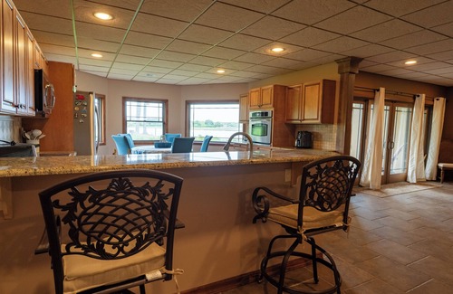 East Moriches Apartment | Waterfront Luxe Retreat in Mansion + Beach Access