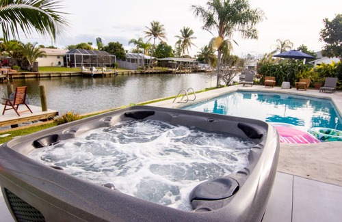 Venetian Way House | Waterfront Oasis 3B/3B Private Heated Pool, Hot Tub & Dock! 1/2 mile from Ocean!