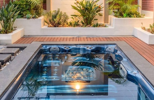 Glenelg North Apartment | Waterfront Paradise heated swim spa