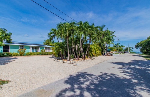 Marathon House | Waterfront & Privacy, Heated Pool HotTub & waterfall, 60' Dock TikiHut, pets ok