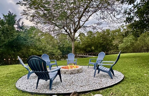 Wellington House | Waterfront Resort Style Oasis ~ 2 Acres, Heated SW Pool, Fire Pit, Outdoor Games