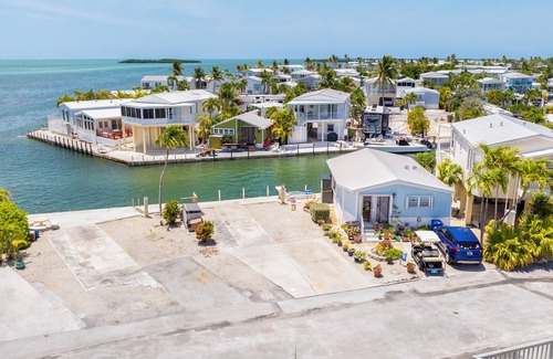 Cudjoe Key RV Rental | Waterfront RV Lot Just 2 Spots from Open Water with 35' Seawall—Fish, Boat & Relax in Paradise!