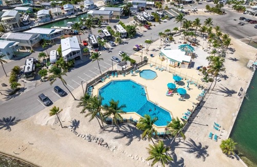 Cudjoe Key RV Rental | Waterfront RV Lot w 35' dock in "Venture Out". Utility hookups & beautiful views