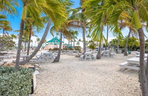 Cudjoe Key RV Rental | Waterfront RV Lot w 35' dock in "Venture Out". Utility hookups & beautiful views