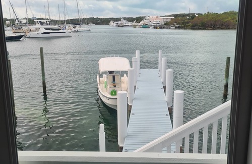 Lubbers Quarters Cay Villa | WATERFRONT VILLA with deck to enjoy the scenic views & historical lighthouse.