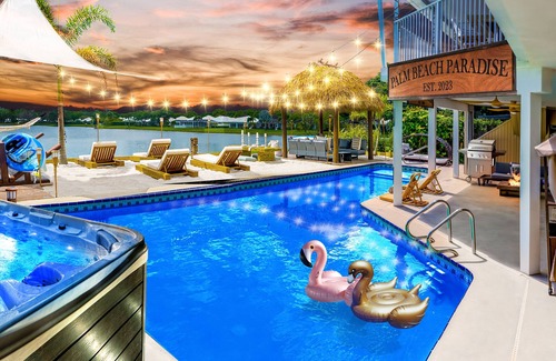 Florida North Atlantic Coast Villa | Waterfront w/ Beach, Htd Pool Cinema Gameroom Tiki