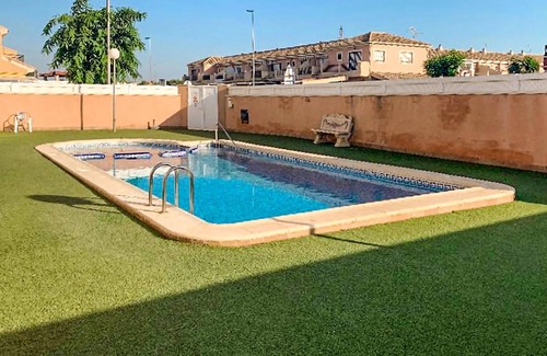 Santiago de la Ribera Apartment | Welcome to this compact vacation apartment, which guarantees you the sea view on two roof terraces.
