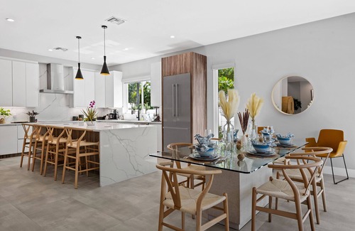Middle River Terrace House | WELCOME TO THE RIVERHOUSE, A STUNNING MODERN HEATED POOL HOME ON WATERWAY!