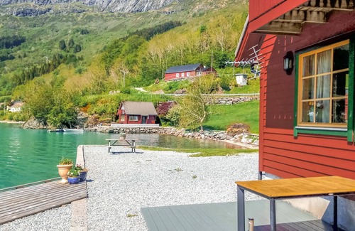 Hyllestad House | Welcome to this very nice cottage in an idyllic location on the shore of the fjord.