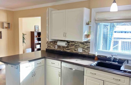 Fredericton House | Welcome to your home away from home located in a quiet family-friendly neighborhood