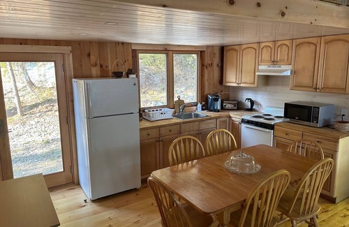 Otis Cabin | Welcoming 4-bedroom lake front cabin in charming Otis on Beech Hill Pond.