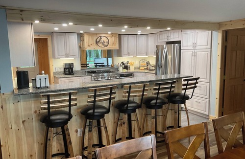 Lewiston House | Welcoming lake house with five bedrooms and a huge deck on Tee lake in Lewiston.