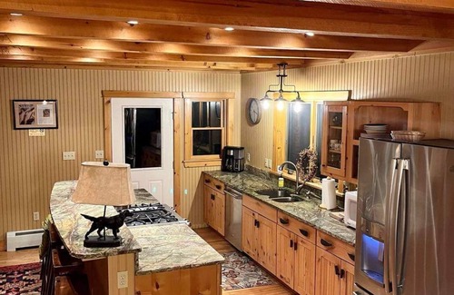 Caratunk Cabin | Well accommodated lakeside lodge with ITS trail access near West Forks, Maine.