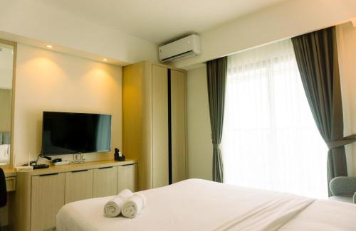 Pondok Aren Apartment | Well Furnished and Elegant 1BR at Bintaro Embarcadero Apartment By Travelio