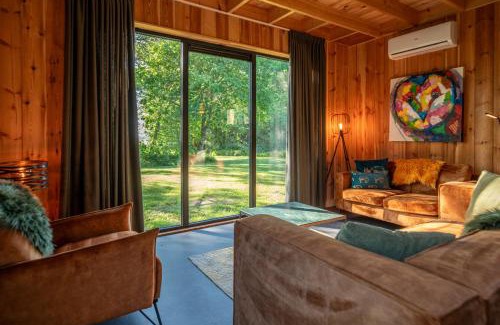 Stieltjeskanaal Apartment | Wellnesslodge Scholekster met jacuzzi en uitzicht