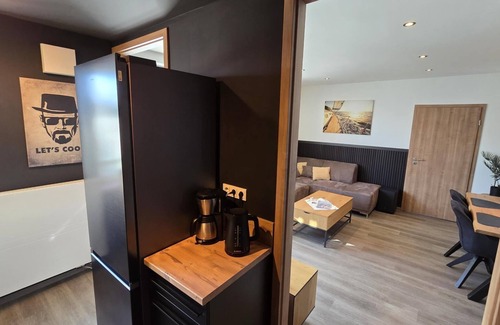 Dornumersiel House | Whirlpool + fireplace + dogs welcome + fully fenced garden + free WiFi + in quiet vacation settlement directly behind the dike/beach + fully equipped + own garden terrace covered + charging possibility e-car
