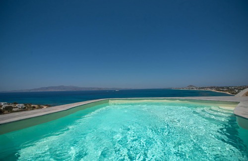 Maragas Villa | White Stone Art Villa, luxury seaside ORKOS Plaka, sublime panorama