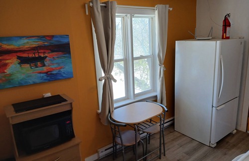 Winnipeg Apartment | Who likes red poang? Near downtown