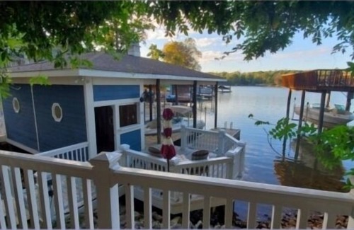 North Shore House | Wifi, hot tub, pool table, air hockey, and fully loaded boat house!. This is Lake Lxury!