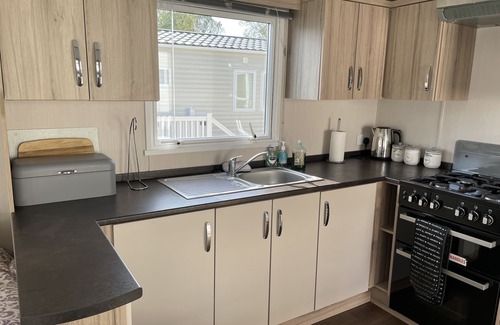 Hamworthy House | Wild Rose Gorgeous Caravan on Rockley Park with Sea View close to entertainment