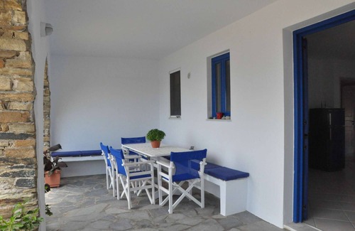 Tinos House | Windmill and houses by the sea // Stavros Bay