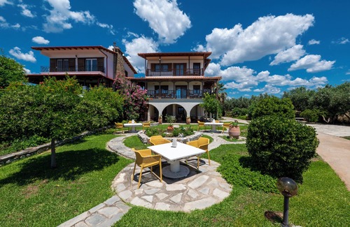 Kalivia Poliyirou Villa | Windmill Villa, a beachfront villa with private pool, for relaxing holidays
