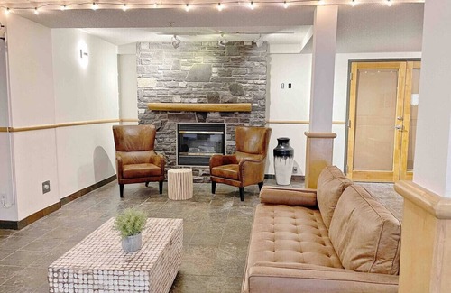Cougar Creek Condo | Windtower lodge QenBed Suite/Heated UGParking