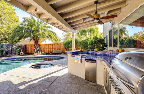 Windsor House | Wine Country Retreat. Large backyard with pool/spa, outdoor kitchen & fireplace