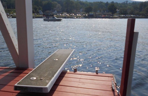 Alton Bay House | Winnipesaukee lakefront house includes slip, deck, hot tub & sleeps up to 11