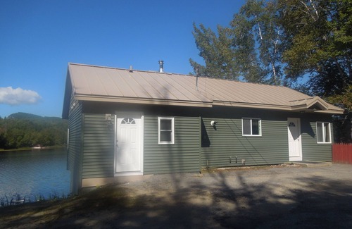 Peru House | Winter, Spring, Summer, or Fall this Worthley Pond Cottage has it all.