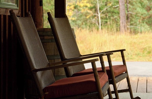 Superior Cabin | With breathtaking views of Sheep Mountain, the Bunkhouse Cabin is a single-level residence with two bedrooms and two full baths. Sleeps 10 with easy access to the Six8 Saloon and entertainment area with horseshoe and fire pits. Generous outdoor space