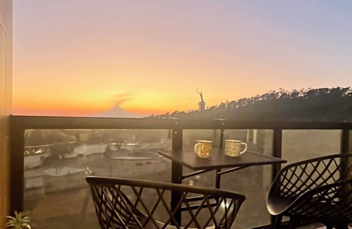 Puebla Apartment | Wonderful view, wooded road and shopping plaza across the street.