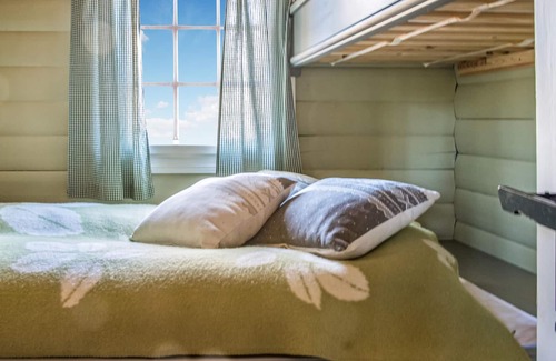 Rena House | Wonderful cottage with its own fireplace on the property.