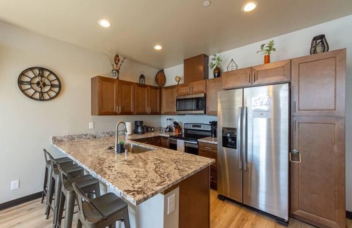 Valley House | Wonderful Triplex Unit With Spectacular Lake View!