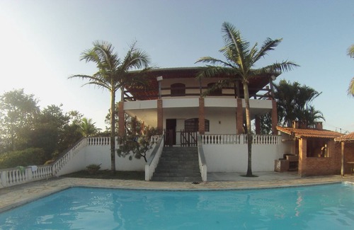Guararema House | Wooded lot, pool, barbecue, pool and gazebo with beautiful view.