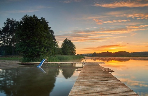 gmina Osiek House | Wooden Holiday Home in Skrzynia with Terrace