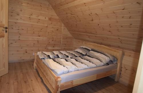 gmina Osiek House | Wooden Holiday Home in Skrzynia with Terrace