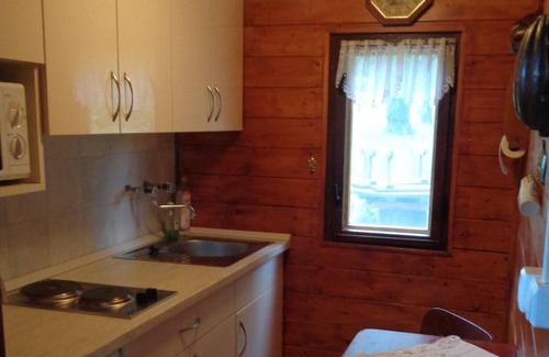 Nemesbuk House | Wooden holiday house Lisa in a dream situation with a view