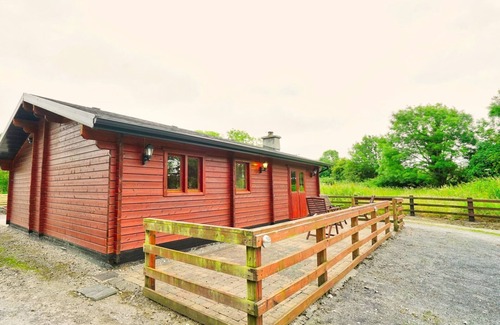 Clarinbridge House | Wooden log cabin entirely place