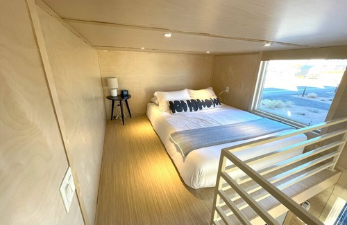 Pear Park House | XL tiny home with two lofted queen beds and full size futon on the main level.