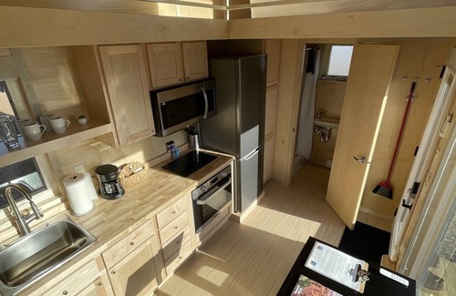 Pear Park House | XL tiny home with two lofted queen beds and full size futon on the main level.