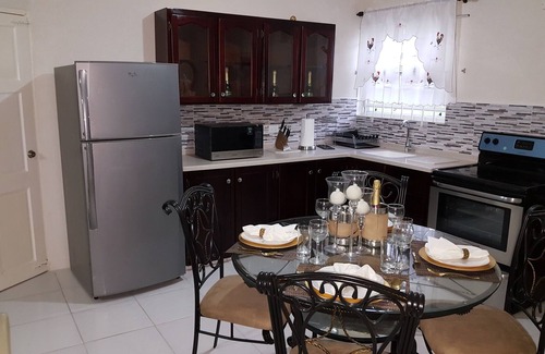 Oistins Apartment | Xquisite Suites ~ Where Luxury and Convenience Converge