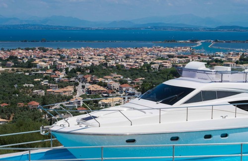 Lefkada Boat Rental | Yacht with a private pool & panoramic sea and city view @ Silencio Luxury Homes