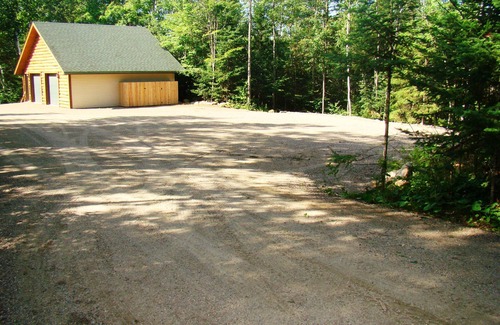 Pickerel Cabin | Year-round cabin, wooded riverfront on Lily River, WiFi, Central A/C, ATV Trails