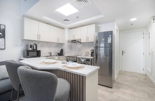 Jumeirah Village Circle Apartment | Your Dream Stay in JVC - Stylish Studio for 4!