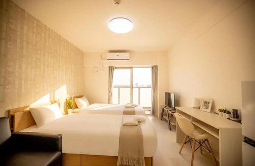 Taisho-ku Apartment | You can arrive at Onsen Daisekai and Abeno Harukas in 10 minutes! Public foyer, kitchen facilities provided