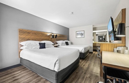 Orchard District Hotel | Your Home Away From Home 2 Comfortable Units! Enjoy Swimming Pool Access!