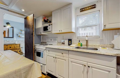 Winnisquam Cottage | Your Lakeside Getaway: Cozy Cottage, Dock, Endless Family Fun!